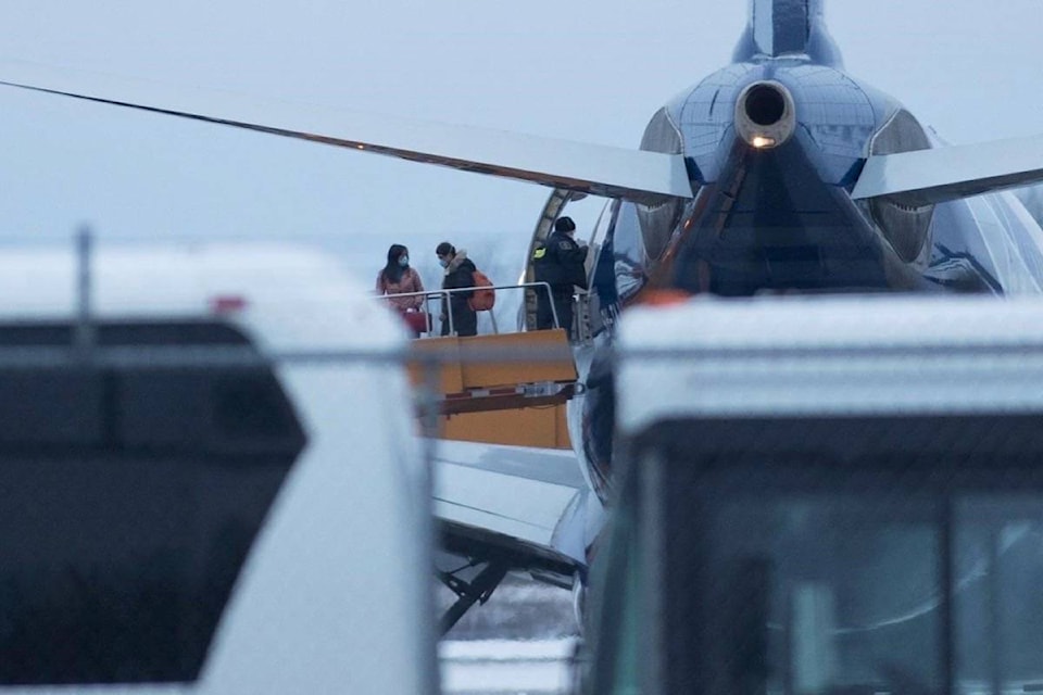 20505344_web1_200211-RDA-Second-plane-carrying-evacuees-from-Wuhan-arrives-at-CFB-Trenton-in-Ontario-coronavirus_1