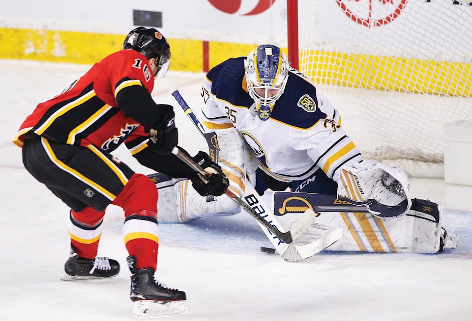 21629241_web1_191206-RDA-Flames-beat-sabres