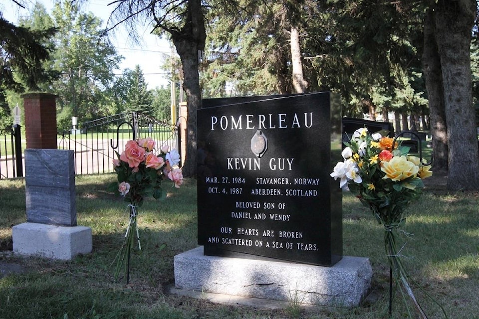 22447901_web1_200828-RDA-cemetery-vandalism-grave_2