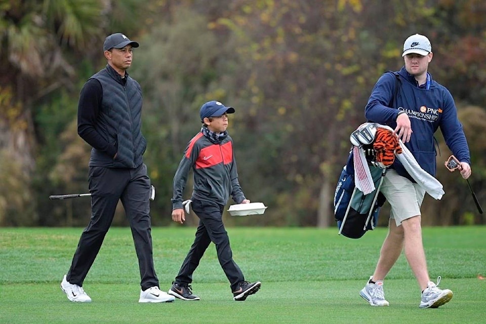23680051_web1_201218-RDA-From-father-to-son-Tiger-Woods-looking-only-for-enjoyment-golf_1