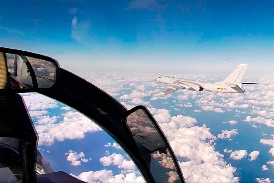 23717048_web1_201222-RDA-Russian-and-Chinese-bombers-fly-joint-patrol-over-Pacific-russia_1