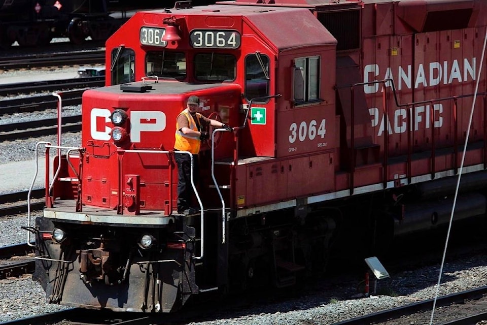 24593749_web1_210322-RDA-Stars-align-for-CP-Rail-deal-to-buy-rival-for-US25-billion-HQ-remains-in-Calgary-railway_1