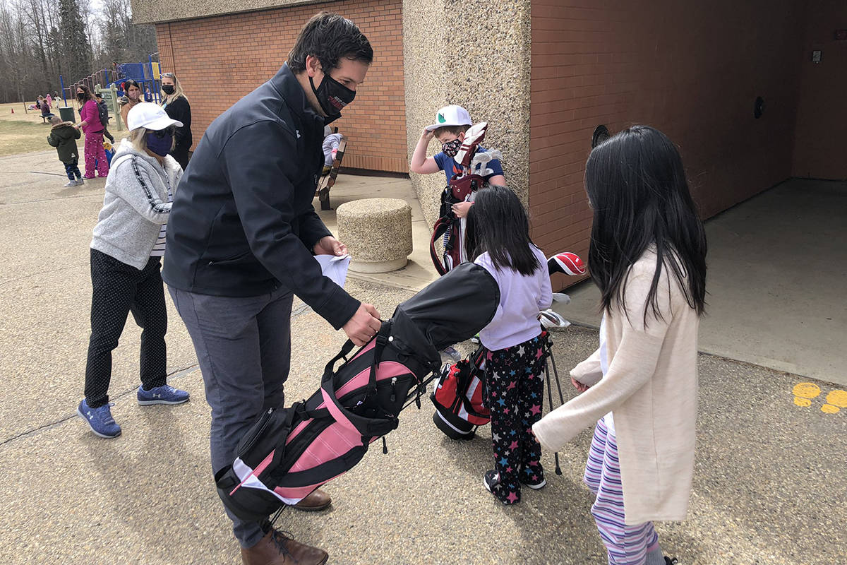Red Deer man raises money, donates golf clubs to children Red Deer