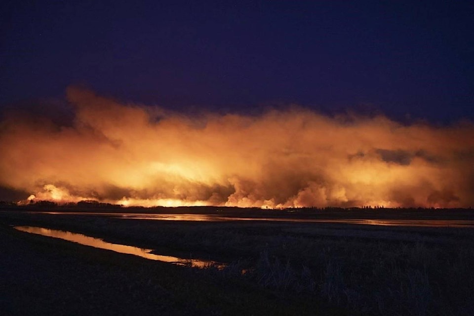 25403150_web1_210519-RDA-Saskatchewan-wildfire-grows-forcing-evacuations-in-the-area-to-expand-wildfire_1