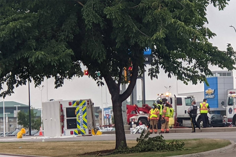 An ambulance was toppled on its side in a collision in Red Deer about 6 p.m. on Tuesday. (Photo tweeted by Edward McIntyre)