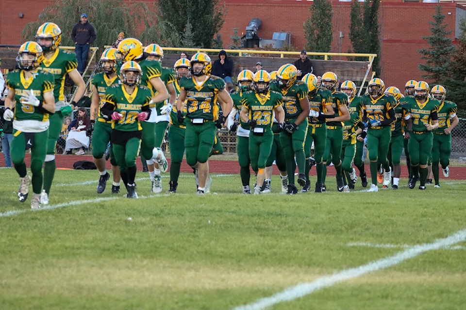 Stettler Wildcats take the field in their 2022 home opener on Sept. 23. (Kevin Sabo/Stettler Independet)