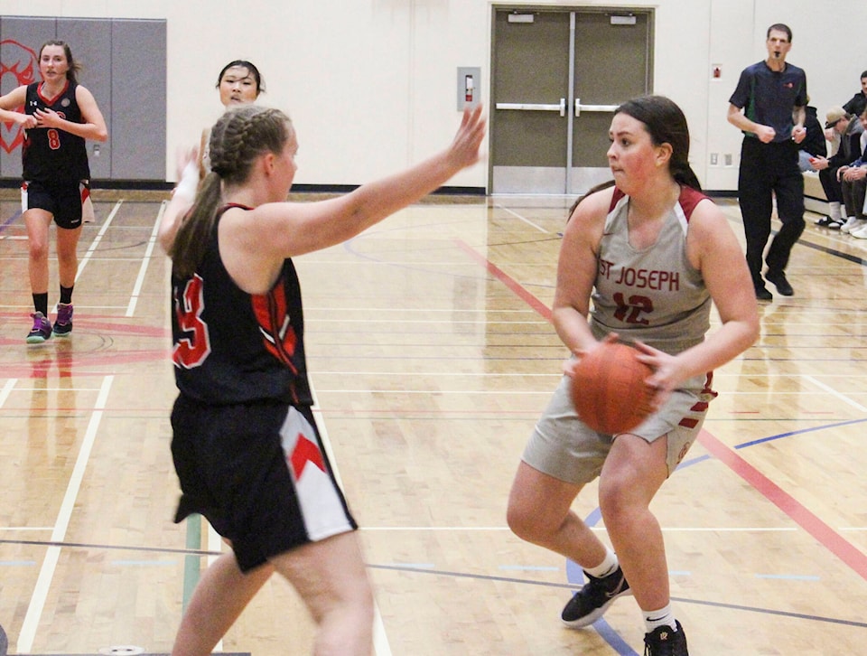 31335714_web1_221216-RDA-St-joseph-girls-bball_1