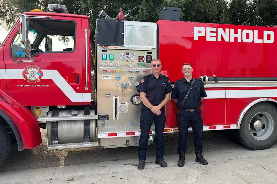 33634240_web1_230817-rda-penhold-firefighters-fire_1