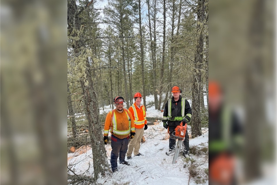 Nupqu foreman Lawrence Williams and ʔakisq̓nuk natural resources manager Grant Glessing with another worker from Nupqu at a project site near Invermere for wildfire mitigation.