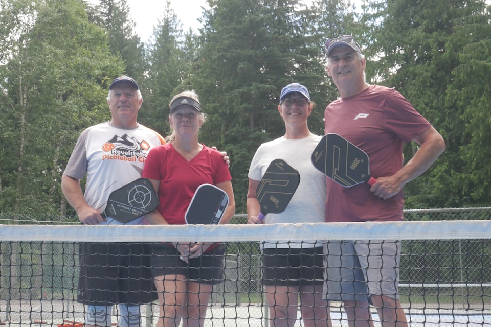 From left, Will and Miya Hayman and Debbie and Les Daley of the Revelstoke Pickleball Club at the Columbia Park courts on Thursday, Aug. 7.