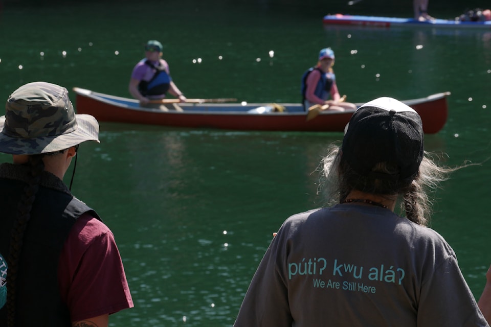 Members of the Sinixt Confederacy and other paddlers embark from the Martha Creek Provincial Park boat launch on a 10-day canoe voyage down the Columbia River basin to Kettle Falls, Wash., on Wednesday, June 11.