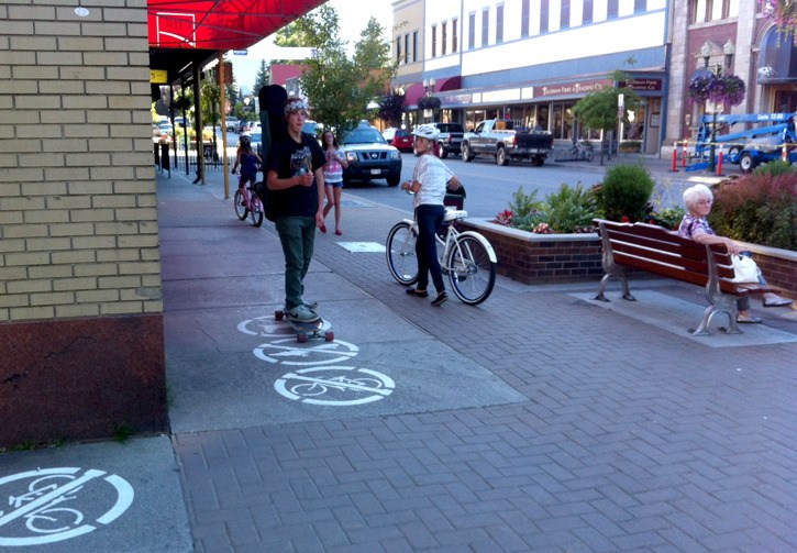 Revelstoke sidewalk 'no' signs will stay until they fade away