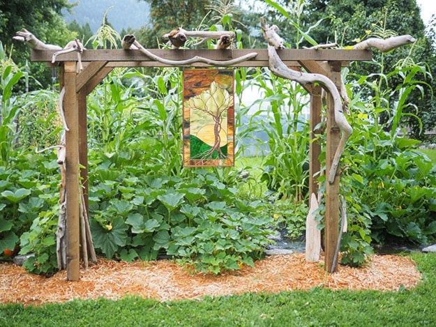 A stain glass window by Geordie Knoess in his garden.