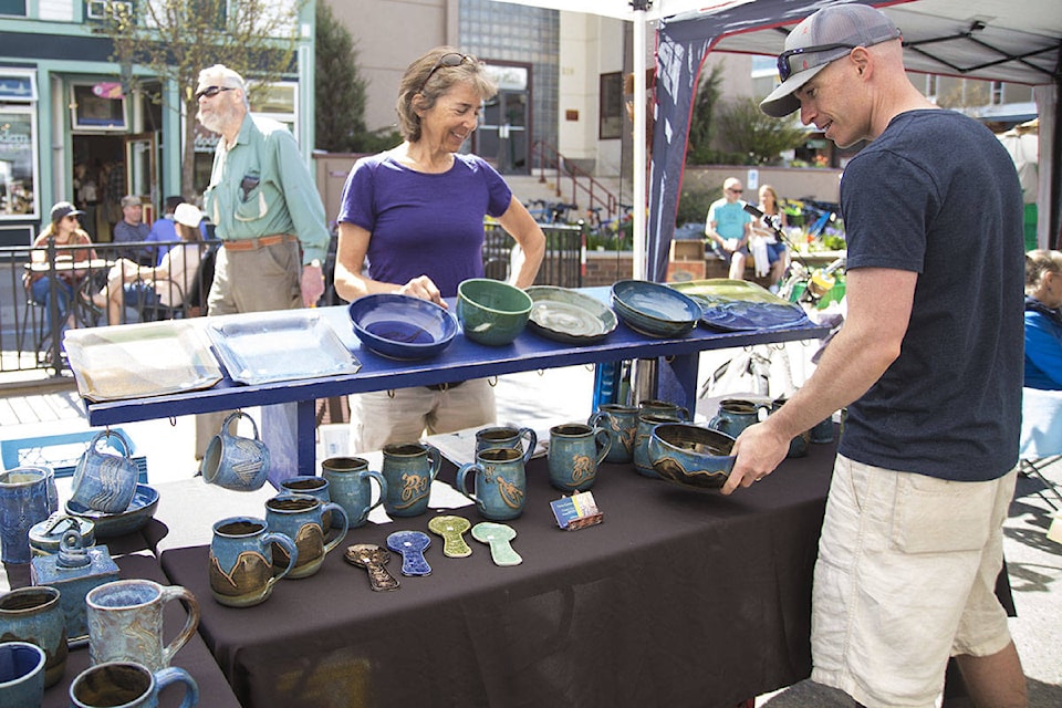 The first market of the year featured everything from fresh vegetables to pottery like Nancy Geismar’s. Photo by Jocelyn Doll/Revelstoke Review