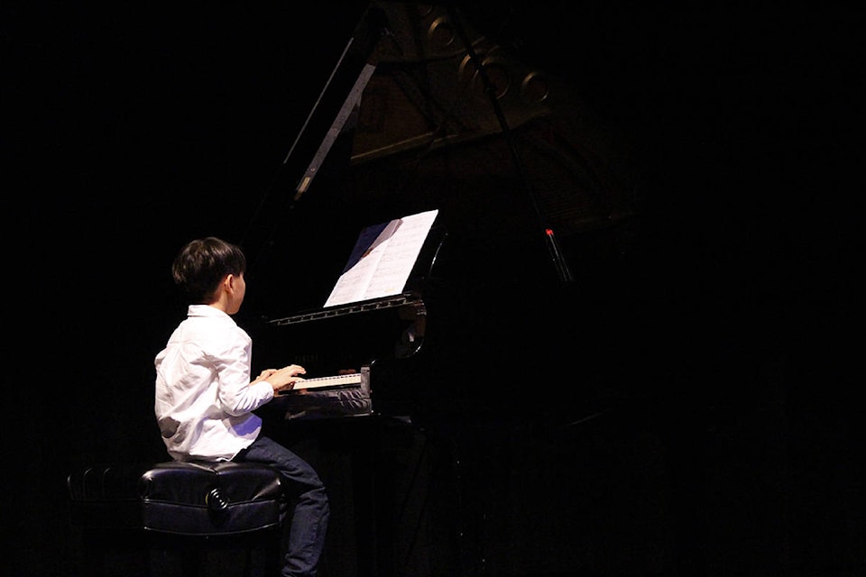 Student pianist David Lee plays “Forest Drums” for the crowd gathered at the Revelstoke Performing Arts Centre. (Nathan Kunz/Revelstoke Review)