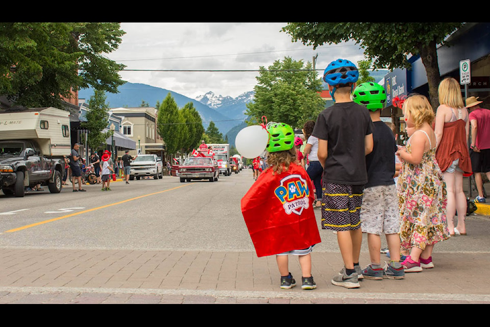 The streets were packed with spectators for the noon parade. They eagerly wait, dressed in their best, excited for candy. (Liam Harrap/Revelstoke Review)