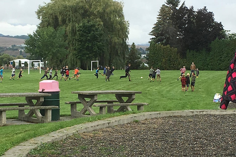 Hillview Elementary’s new liaison officer, Const. Terleski, joined some students in a quick game of soccer early Tuesday morning on Sept. 10, 2019. (Marnie Smiley Macnabb - Vernon Rant and Rave)