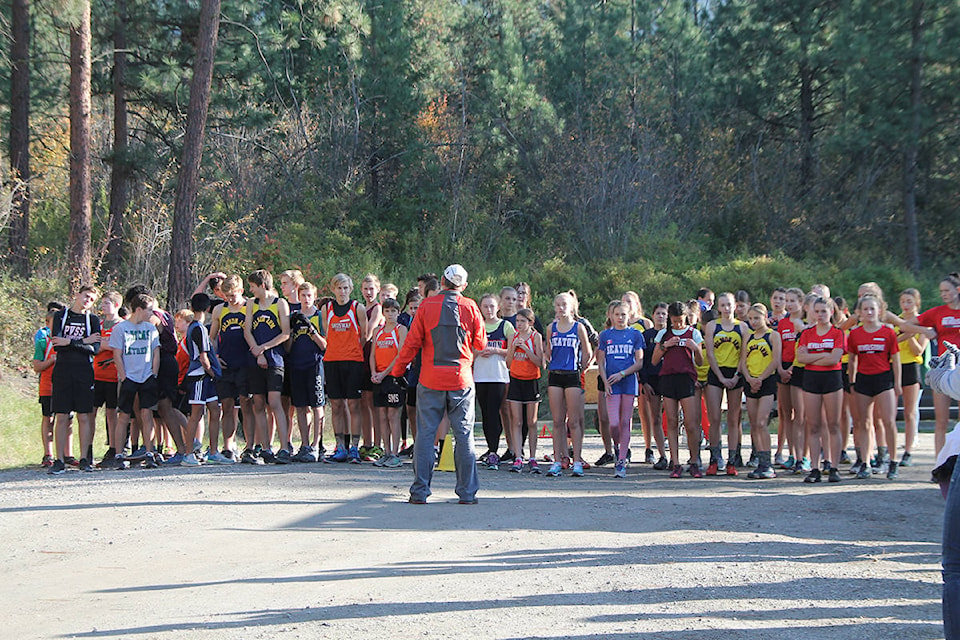 Race director Mark Bendall of host school Vernon Secondary goes over instructions at the starting line for the junior runners at the North Zone high school cross-country running meet Wednesday, Oct. 9, in Coldstream’s Kalamalka Lake Provincial Park. (Roger Knox - Black Press)