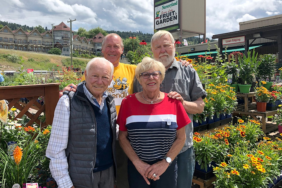 Mike and Joyce Kowaluk (front) with son Kirk Hughes (back left) and nephew Glen Grywacheski at the family business Swan Lake Fruit and Garden Centre during its 60th anniversary in 2019. (Jennifer Smith - Morning Star)