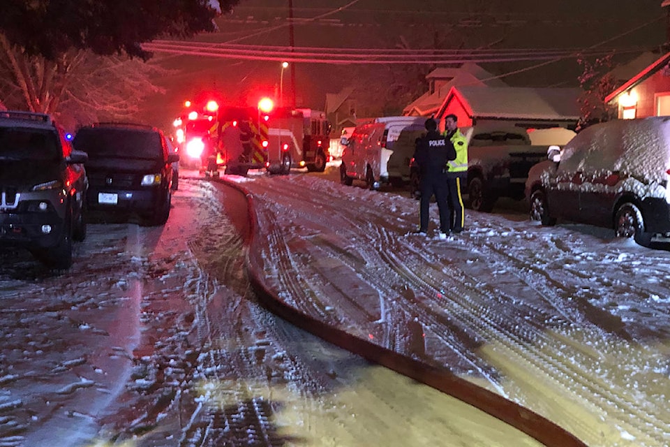 Revelstoke Fire Rescue Services responded to a structure fire near the corner of Robson Ave. and 3rd St. in Revelstoke on the evening of Dec. 7. (Liam Harrap/Revelstoke Review)