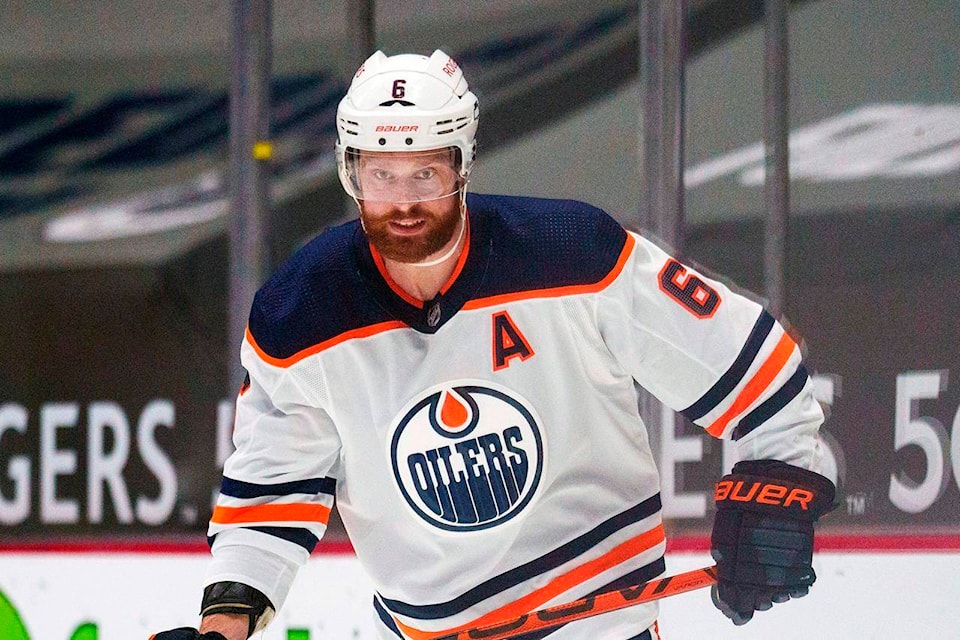 FILE - Edmonton Oilers’ Adam Larsson (6) is shown during an NHL hockey game against the Vancouver Canucks in Vancouver, British Columbia, in this Monday, May 3, 2021, file photo. Adam Larsson and Chris Driedger are going to the Seattle Kraken in the expansion draft. (AP Photo/Nick Didlick, File)