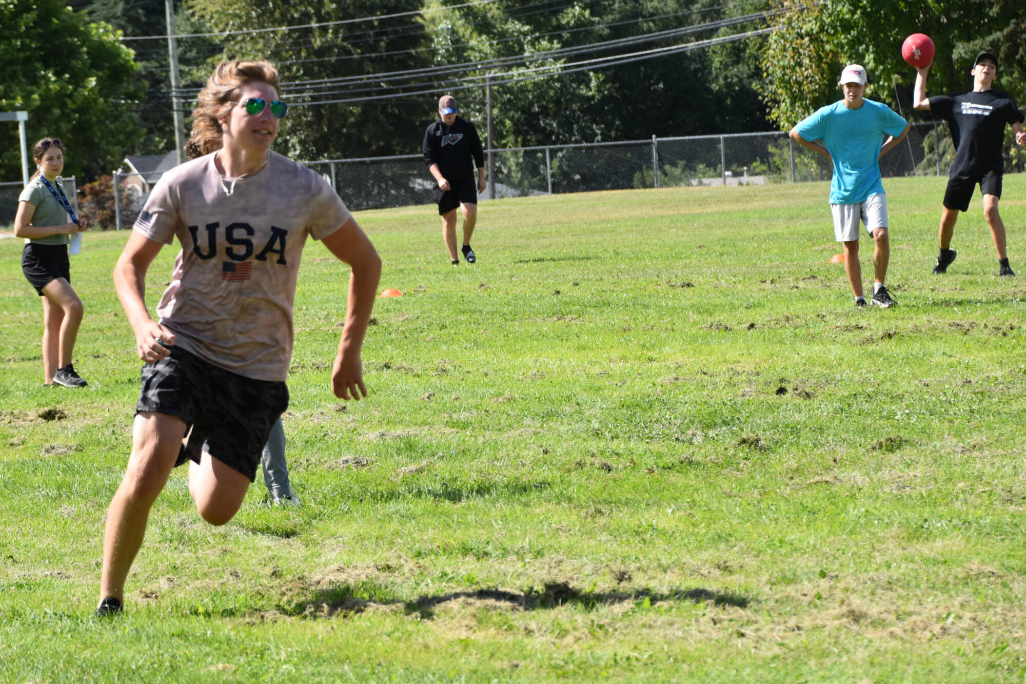 Participants at the BC Hockey Summer Officiating School in Salmon Arm from Aug. 4-8 take time out for a few games of kickball on Aug. 5, 2022. (Martha Wickett-Salmon Arm Observer)