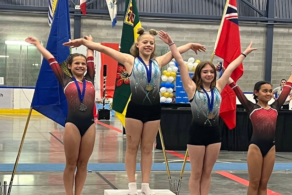 Mia Sappington (gold) and Maggid Hood (bronze) being awarded their medals at westerns in June. (Contributed by Jill Drake)