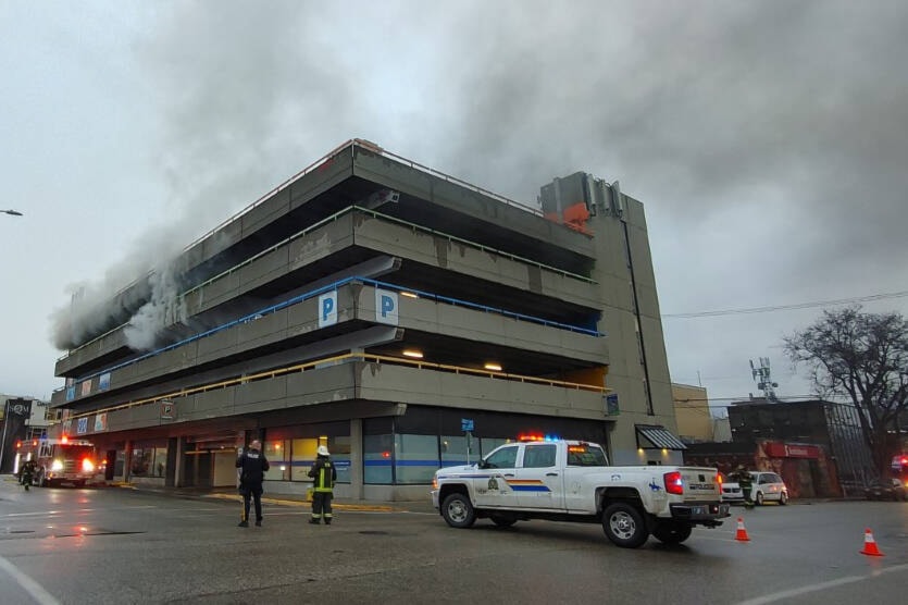 Firefighters battle a vehicle fire in the Vernon Parkade Friday, Nov. 25. (Deena Lehoux photo)