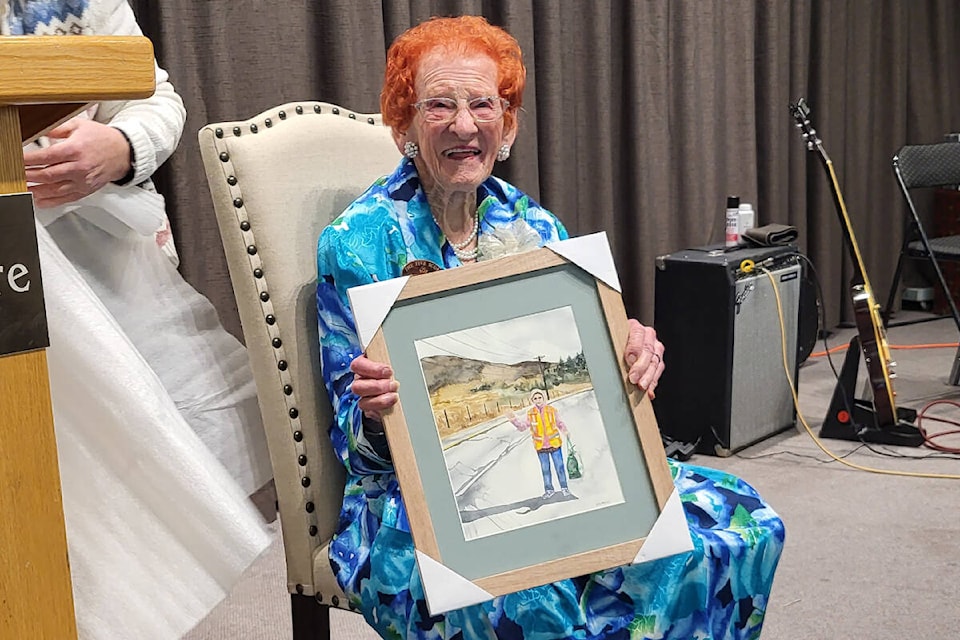 Beloved Armstrong Grade 1 teacher and Vernon trash collector Helen Sidney with one of her many gifts from admirers at her (soon-to-be) 100th birthday celebration Thursday, Dec. 15, at Vernon’s Schubert Centre. Sidney officially becomes a centenarian Dec. 24. (Roger Knox - Morning Star)