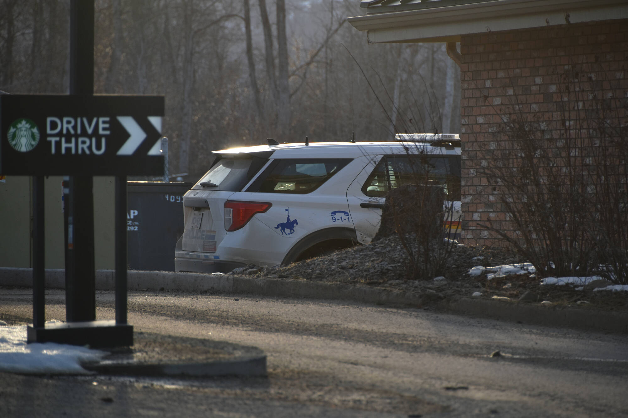 A police vehicle can be seen near the drive-thru at Starbucks in Salmon Arm about 5 p.m. on Monday, March 6. (Martha Wickett - Salmon Arm Observer)