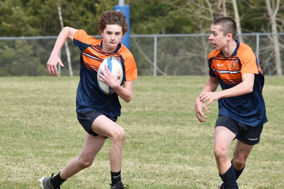 Logan Short, from Airdrie’s Croxford school team, runs with the ball during the tournament at Salmon Arm Secondary’s Sullivan campus Saturday, April 15, 2023. (Rebecca Willson/ Salmon Arm Observer)