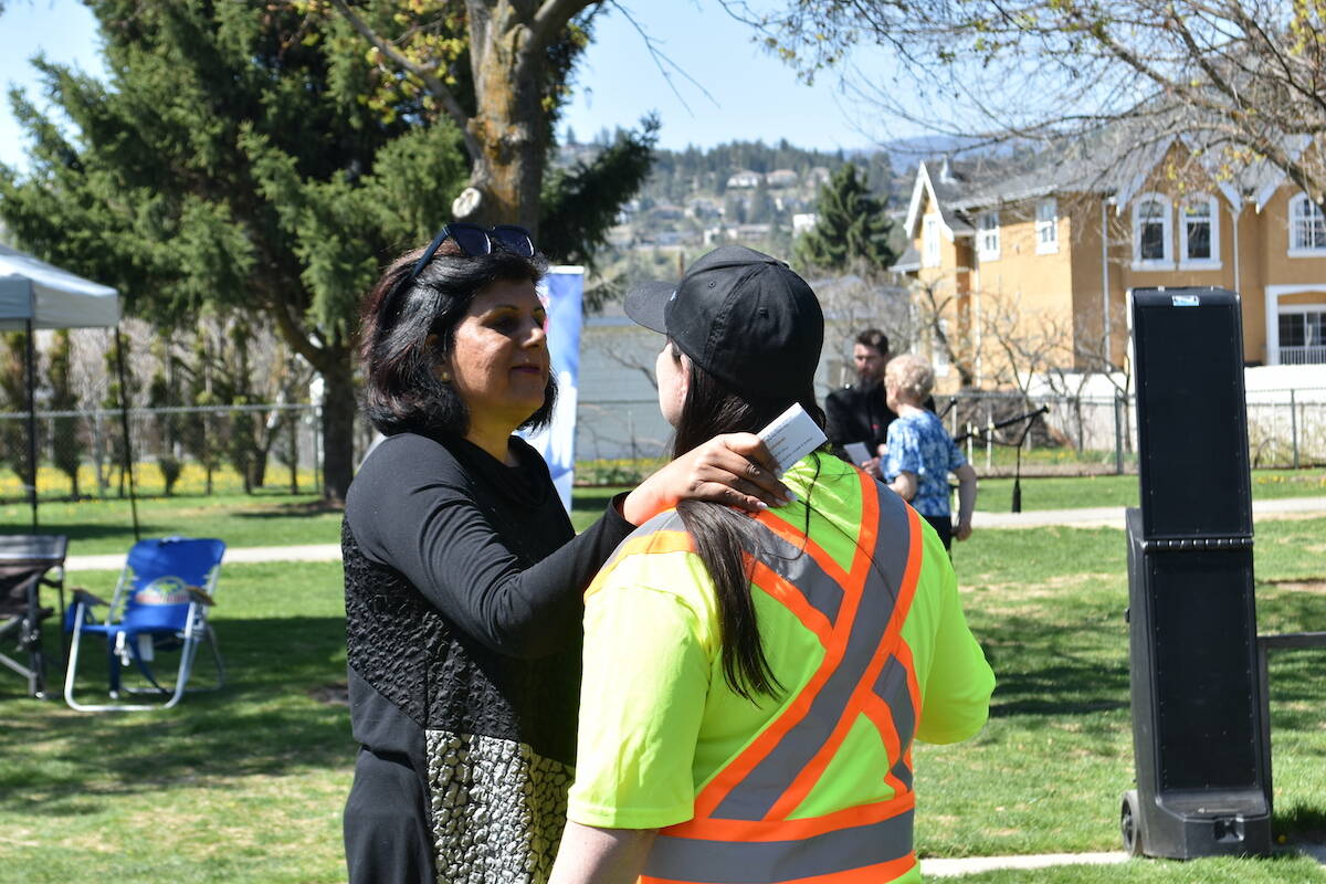 City of Kelowna Councilor Mohini Singh (left) hugs Danielle Pritchett after the Day of Mourning ceremony on Friday, Pritchett's son, Cailen Vilness died in the Kelowna crane collapse on July 12, 2021. (Jordy Cunningham/Capital News)