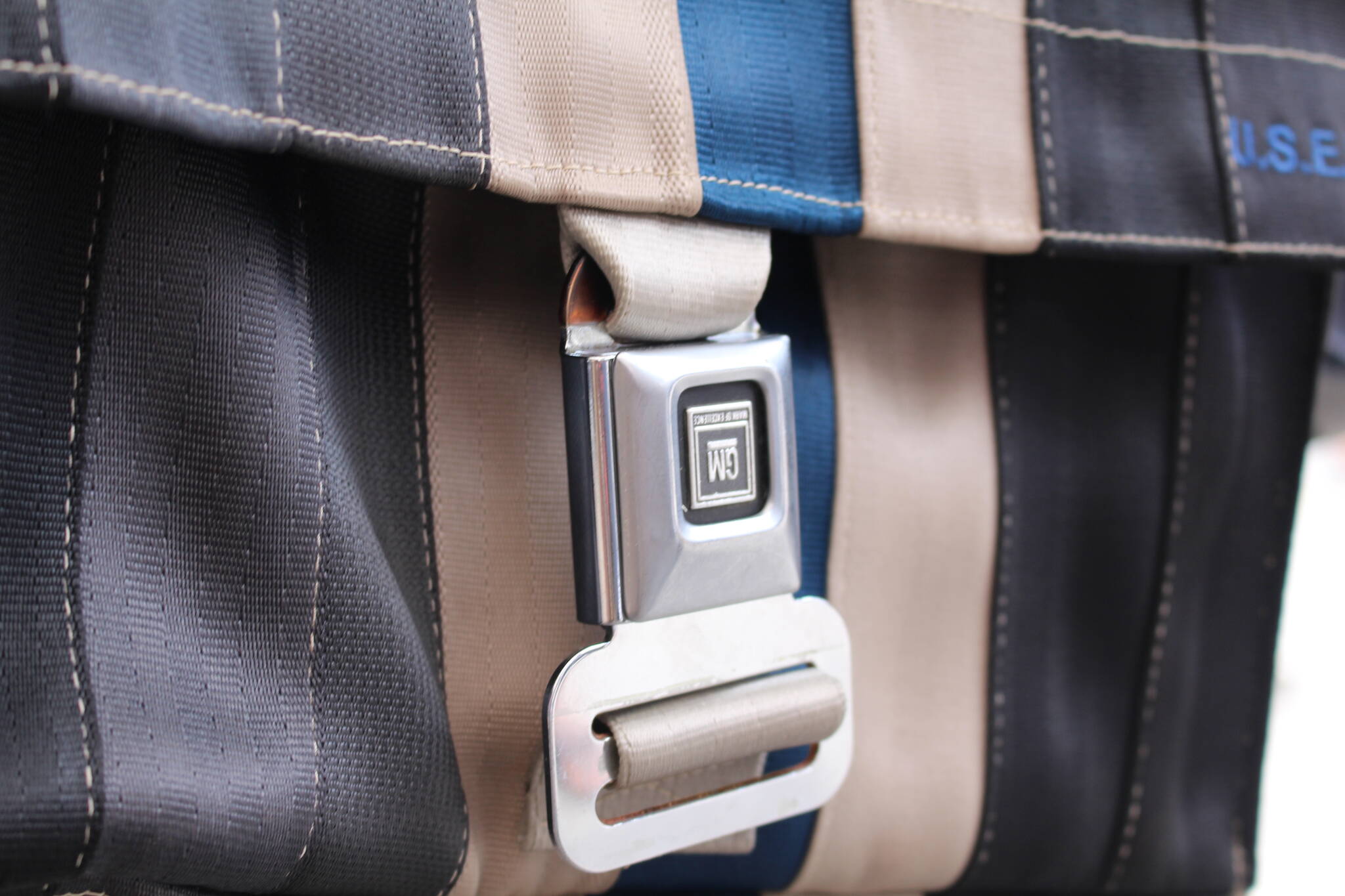 A recycled GM seatbelt buckle gets a new use as a bag latch for one of Kehlers bags. (Zachary Delaney/Revelstoke Review)