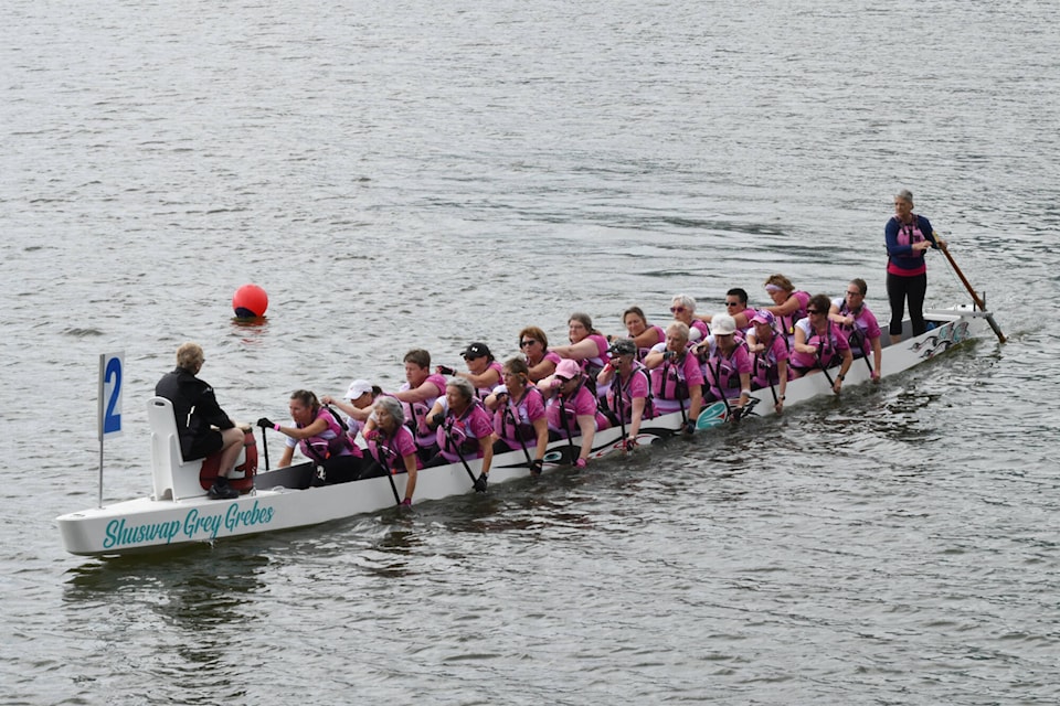 The Spirit Warriors, a breast cancer survivors’ dragon boat team based in Kamloops, paddle hard at the Shuswap Dragon Boat Festival Saturday, June 24, 2023. (Rebecca Willson-Salmon Arm Observer)