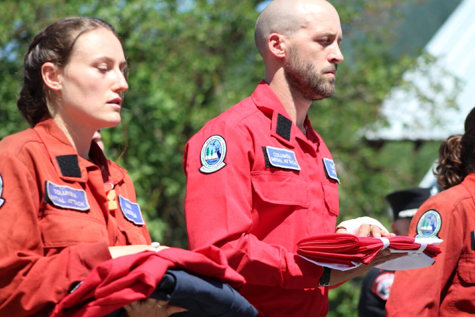 BC Wildfire Service members march in the memorial processional for 19-year-old Devyn Gale who was killed July 13 while helping to fight a wildfire in Revelstoke. (Josh Piercey)