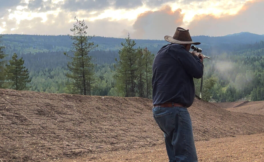 George Buhler firing the first shot on Aug. 2. (Josh Piercey/Revelstoke Review)