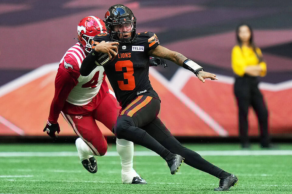 33583884_web1_230812-CPW-CFL-Stampeders-Lions-adams_1