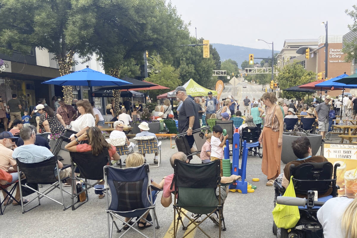 Vernon residents mingle on the street in the citys downtown where a block has been closed to traffic every summer since 2021. Photo: Jennifer Smith
