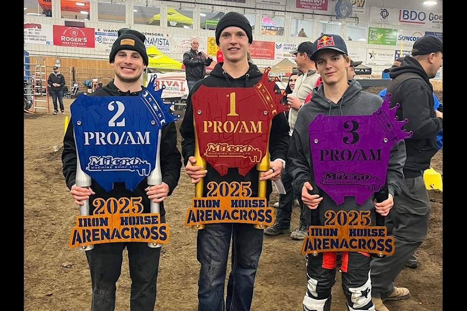 Blake Davies (centre), Tyler Gibbs (left) and Tiger Wood were the top three champions on the ProAm side at the Iron Horse Arenacross event in Rimbey earlier this month. (Photo submitted by Les Nemeth)