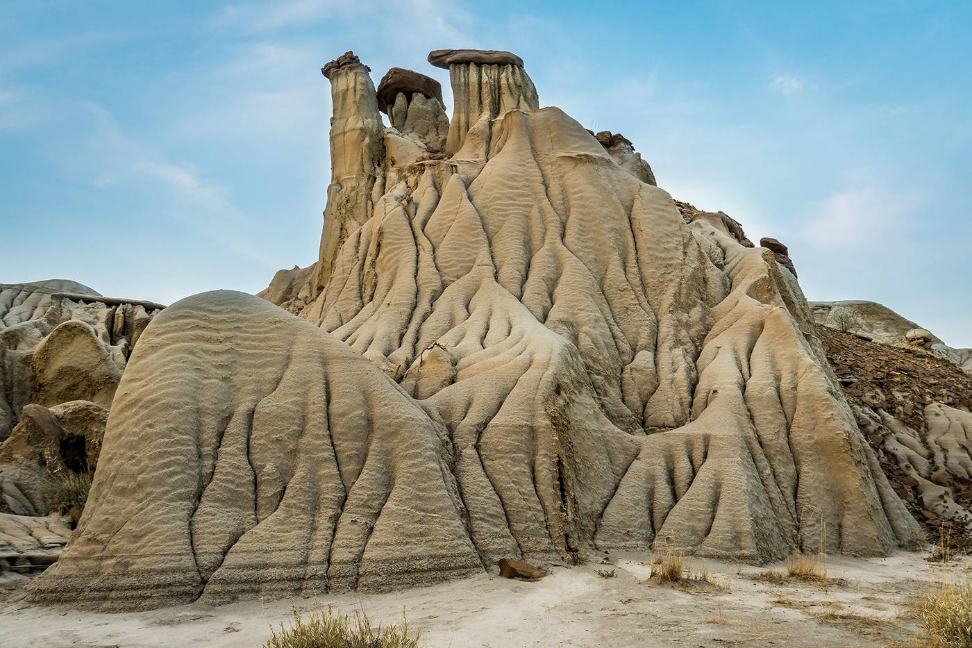 Travel back in time in Albertas badlands, where spellbinding hoodoos rise from the prairie after centuries of erosion. Photo: Kim Passmore