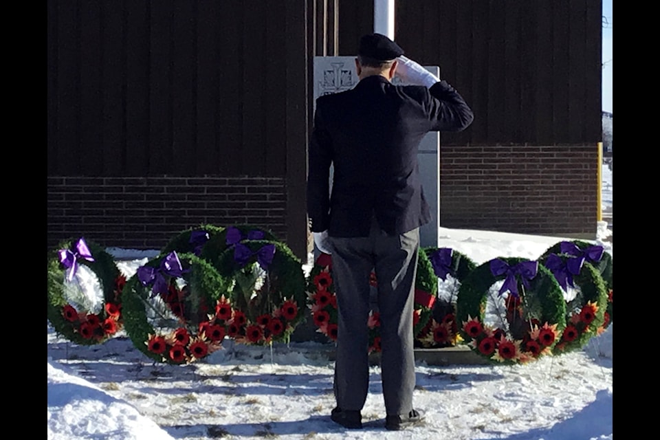 A veteran salutes the cenotaph outside of the Rimbey Legion following the Remembrance Day service on Nov. 11. The service was live streamed this year to keep gathering sizes small. (Photo by Leah Bousfield)