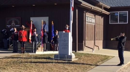 Bugler, Dylan Jeffcott playing the Last Post at the Rimbey Remembrance Service on Nov.11 2021. (Leah Bousfield/RIMBEY REVIEW)