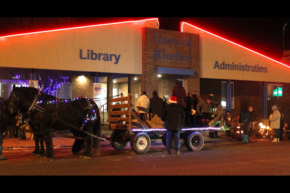 Rimbey residents were treated to a wagon ride and BBQ during the Rimbey Main Street Merchants Twilight Shopping Night. (Christi Albers-Manicke/RIMBEY REVIEW)