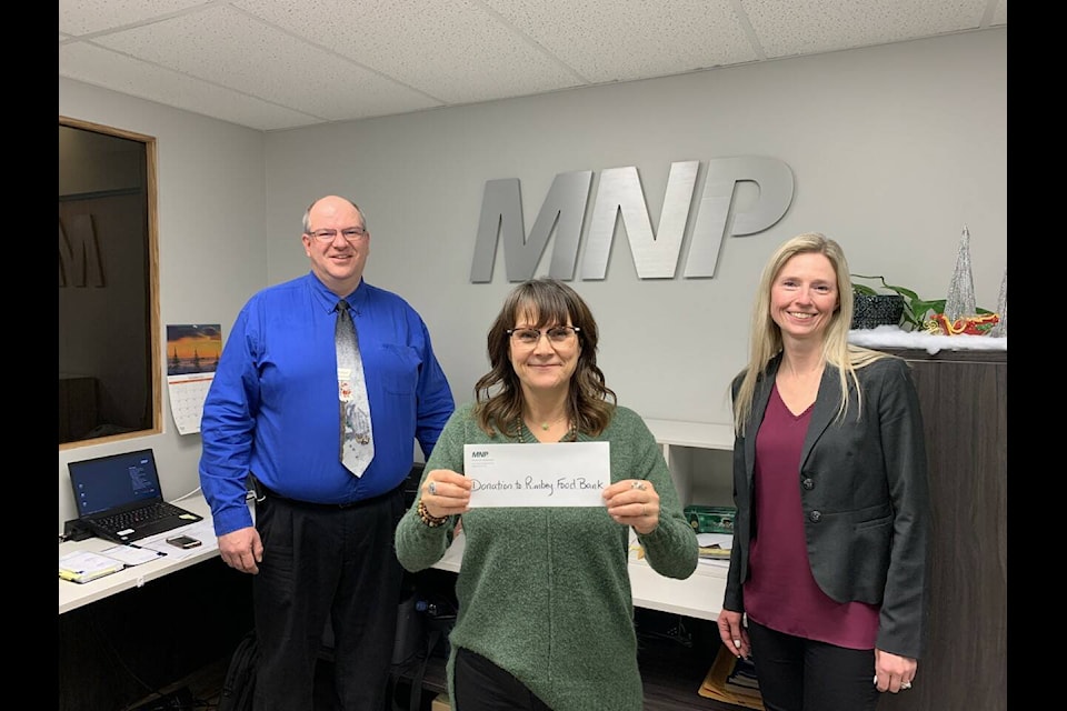 MNP in Rimbey donated their time to clean the foodbank after a busy Christmas Hamper Program where 93 Christmas hampers and gifts were handed out. MNP also gave a generous donation of $7,500 to the food bank. (Submitted)