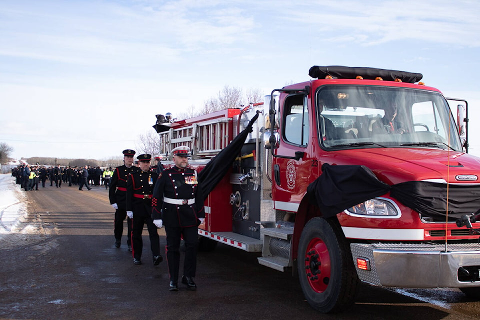 An honour guard made up of firefighters from around the province escorted the funeral processional through town. (Kevin Sabo/BLACK PRESS NEWS MEDIA)