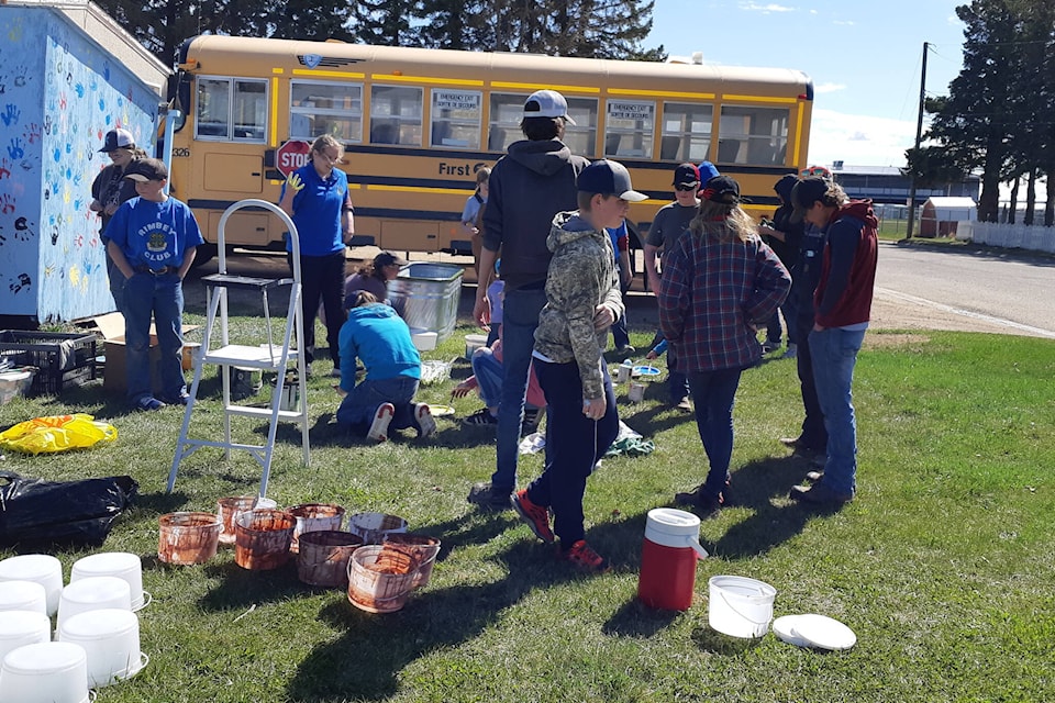 Rimbey 4-H helped tidy up and paint the Rimbey community gardens on May 14. (Submitted)