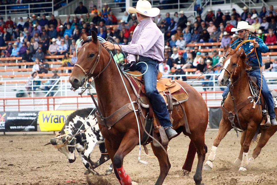 Team ropers Shane Hanchey from Sulphur, LA and Beau Cooper from Stettler had a time of 7.1. (Emily Jaycox/Ponoka News)