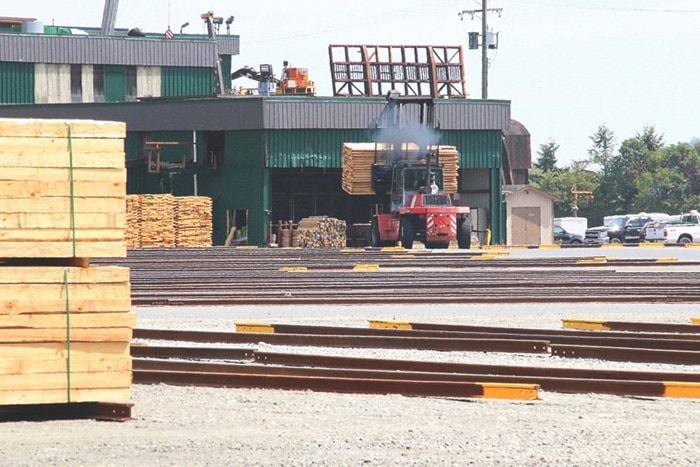 7109trail170426-CCI-M-Cowichan-Bay-sawmill-with-loader-carrying-lumber.c.lb