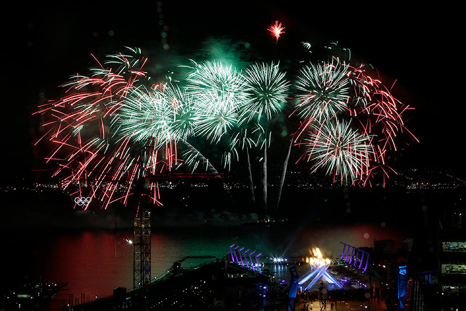 Fireworks explode after the lighting of the cauldron at the Vancouver 2010 Olympics in Vancouver, British Columbia, Friday, Feb. 12, 2010. (AP Photo/Robert F. Bukaty)