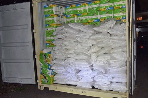 Police seized $75,000 worth of stolen goods including 3,200 pounds of rice from a Langley warehouse on June 26, 2020. (RCMP photo)